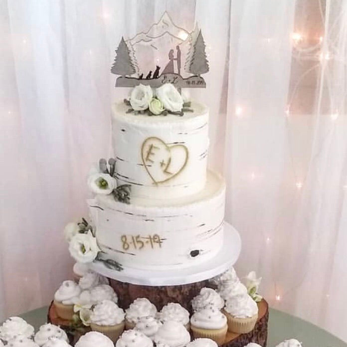 Premium Photo | A cake with chocolate frosting and a small mountain on the  top.